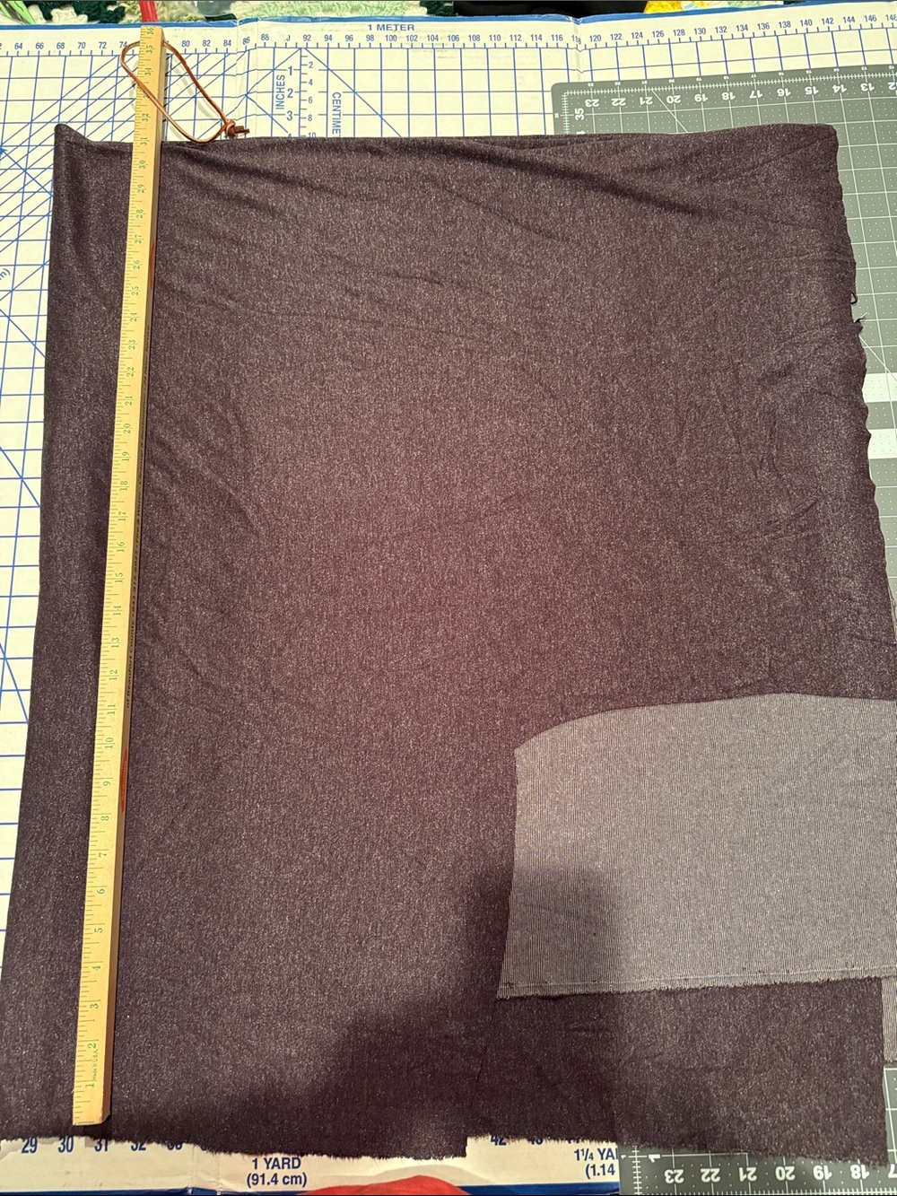 2.75 yd Ribbed knit jersey Fabric in Black with silver accent weave.